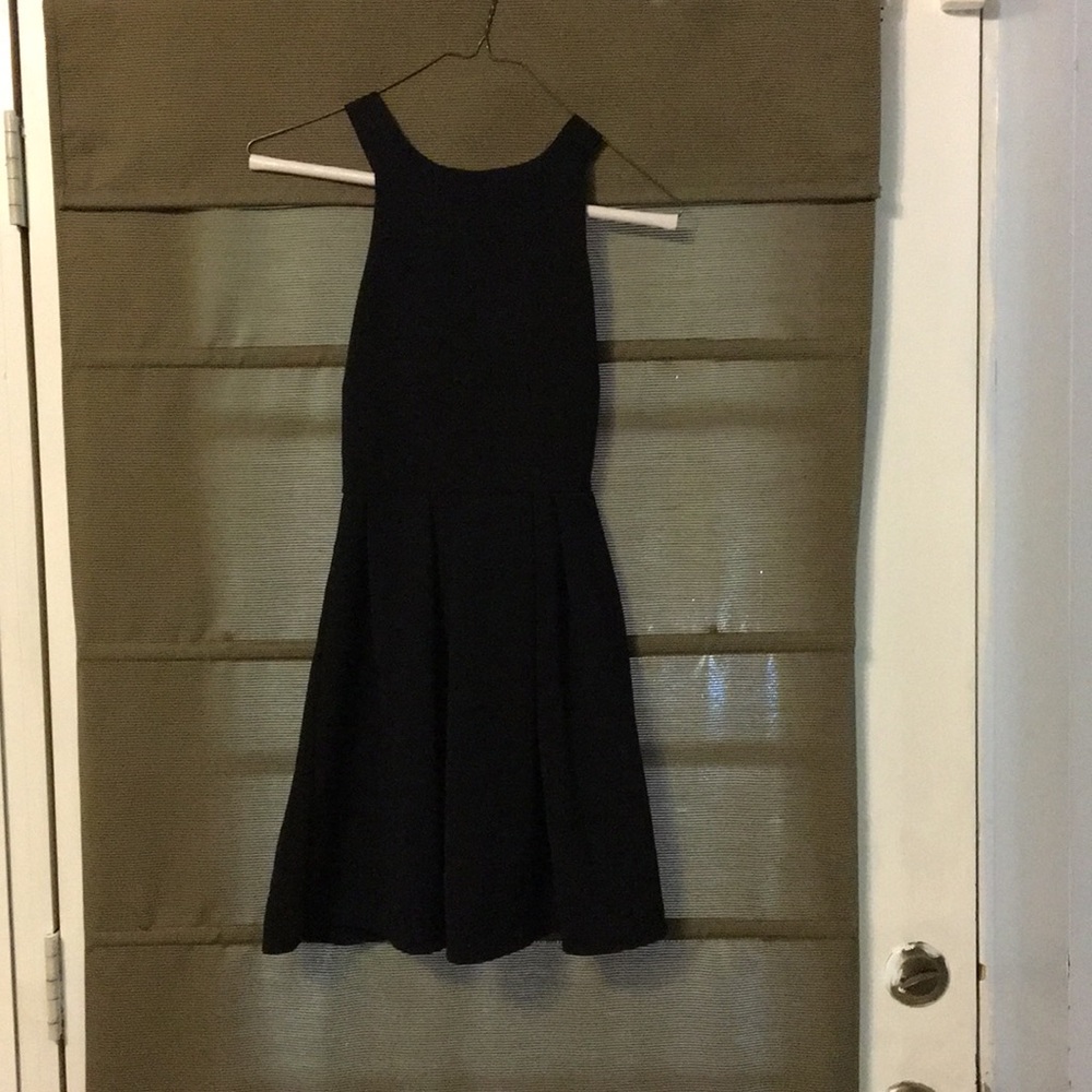 Cute high neck black dress with open back